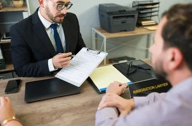 Immigration lawyer consulting a client - Insight Psychiatry Reports
